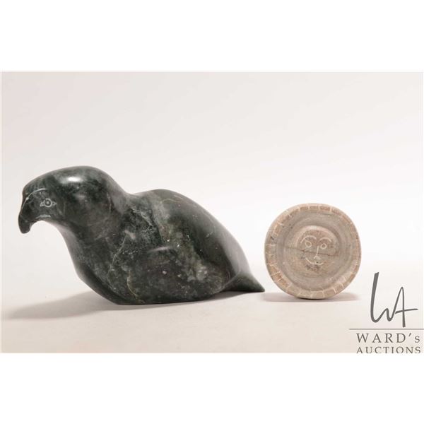 Two hand carved Inuit soapstone including 6" bird, signed in syllabics and an unsigned face/ sun, 2"