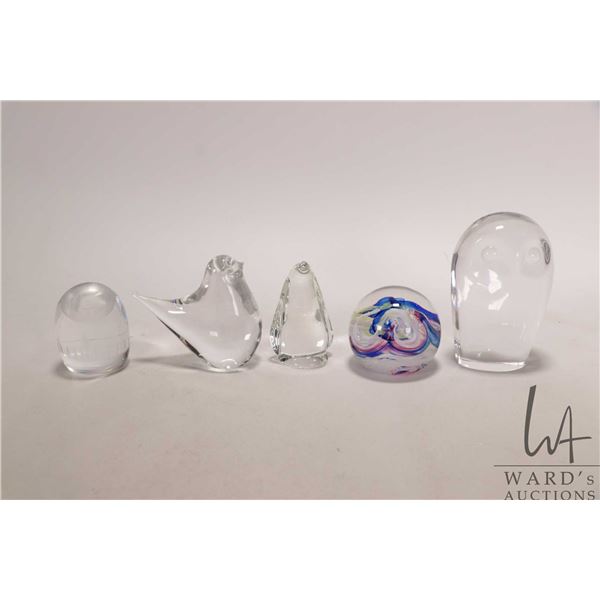 Five vintage decorative glass paperweights including Selkirkglass with colourful swirls, Goebel owl 