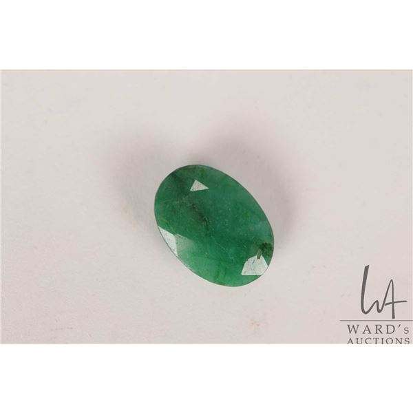 10.05 ct. Columbian Emerald oval cut gemstone with certificate provided by consignor