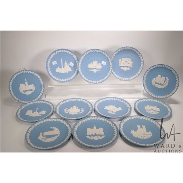 Twelve vintage Wedgwood Jasperware Christmas plates, featuring scenes of English architectures inclu