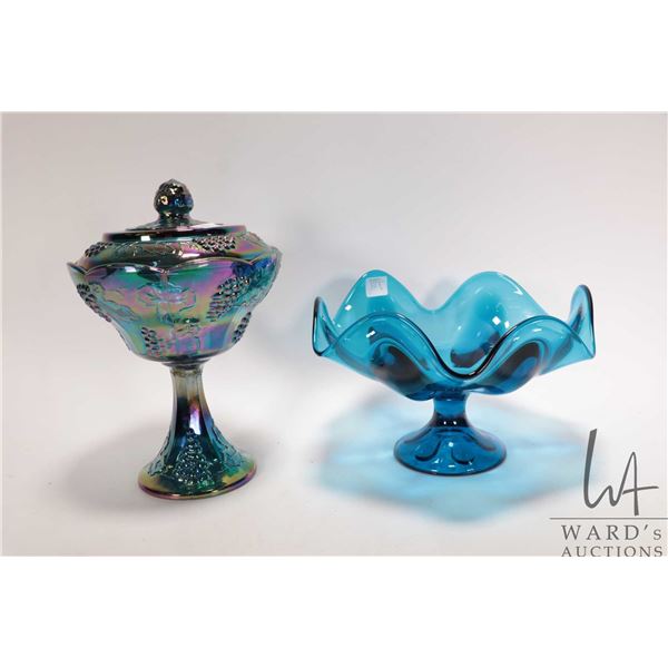 Two pieces of vintage art glass including blue iridescent Carnival glass lidded comport and a fluted