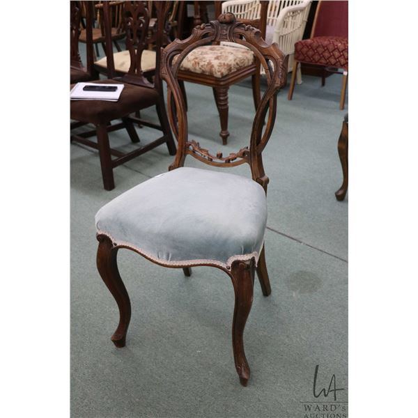 Antique Victorian balloon back chair with curved supports, carved decoration and upholstered seat