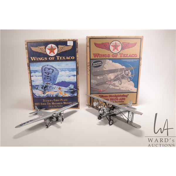 Two Wings of Texaco die cast airplane models including "1927 Ford Tri-Motored Monoplane" and "1929 W