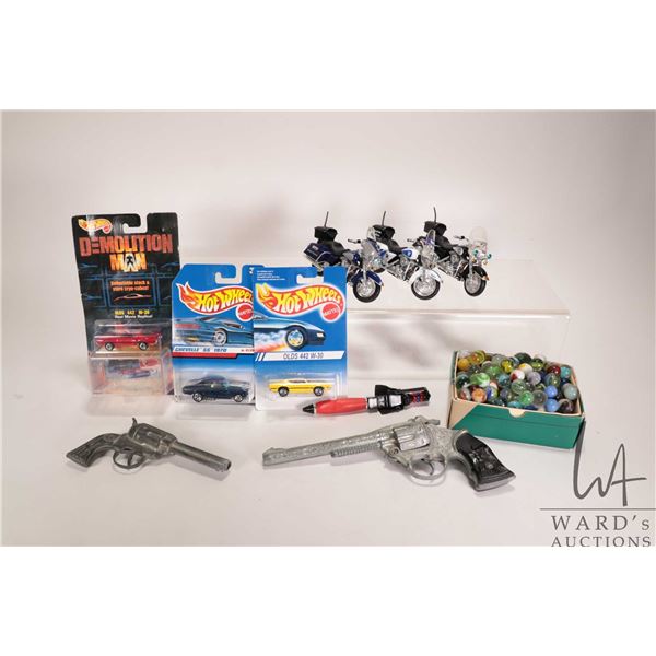 Selection of collectibles including 3 Maisto Harley Davidson police motorbikes, 2 vintage revolver s