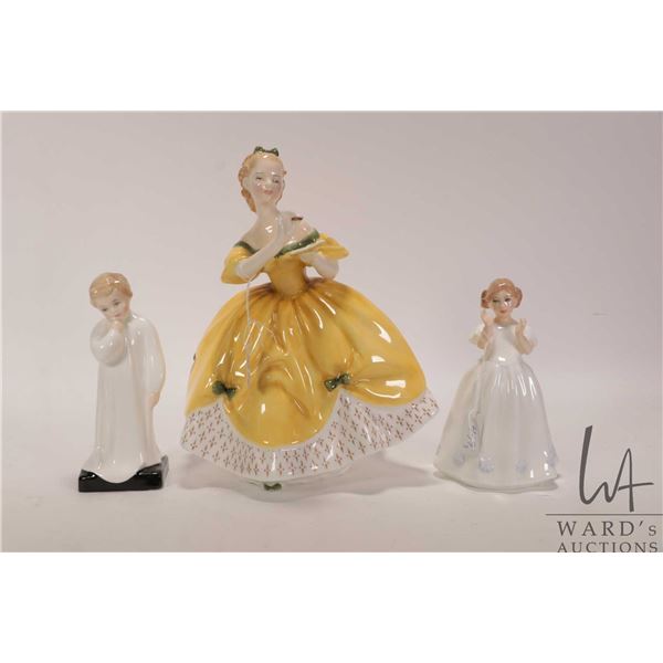 Three Royal Doulton figurines including "The Last Waltz" HN2315, "Catherine" HN3044 and "Darling" HN