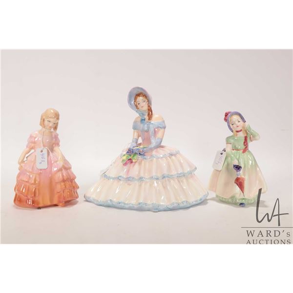 Three Royal Doulton figurines including "Daydreams" HN1731, "Babie" HN1679 and "Rose" HN1368