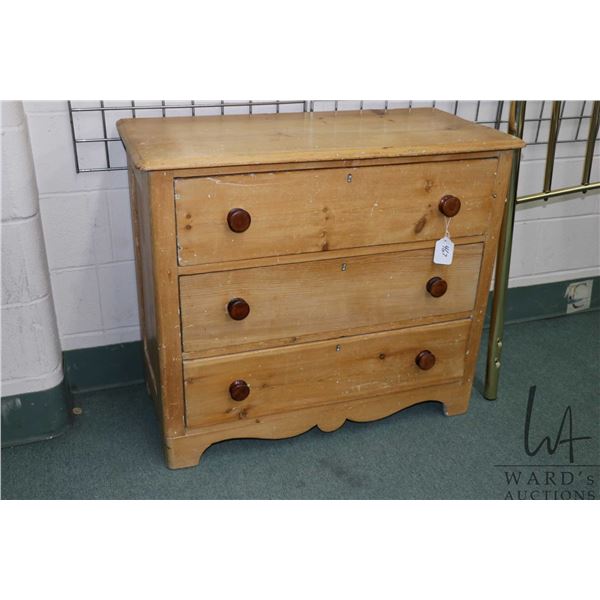 Pine wood three drawer dresser, 31" H X 36" W X 17" D
