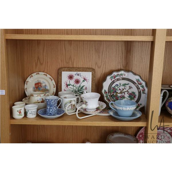Shelf lot of collectibles including Coalport India Tree cake comport, Royal Doulton Bunnykins and We