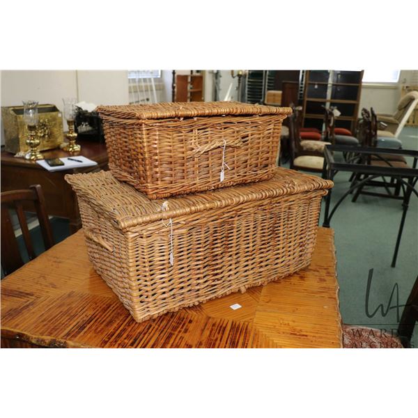 Two vintage wicker picnic baskets including 23" X 11" X 15", and 16" X 8" X 11"