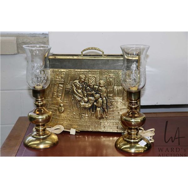 Vintage bas relief brass magazine holder and two bedside lamps with glass hurricane style shades