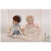 Image 1 : Two small artist made all-bisque baby dolls including 5" boy with glass eyes in knit costume and gir