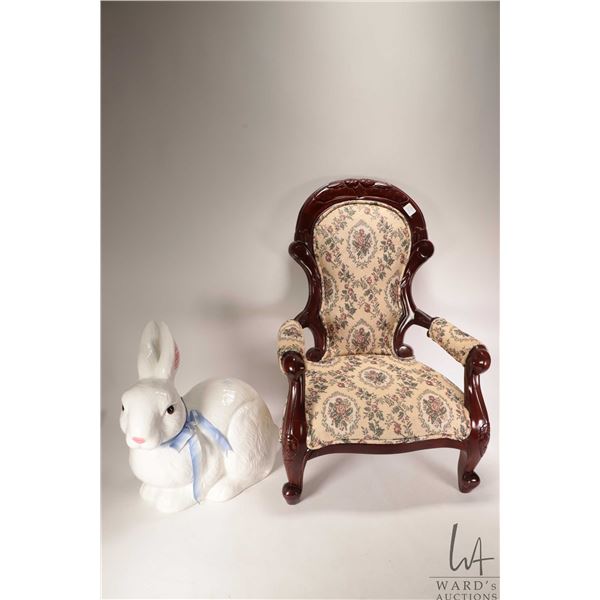 Child sized Victorian upholstered arm chair and a large glazed ceramic rabbit