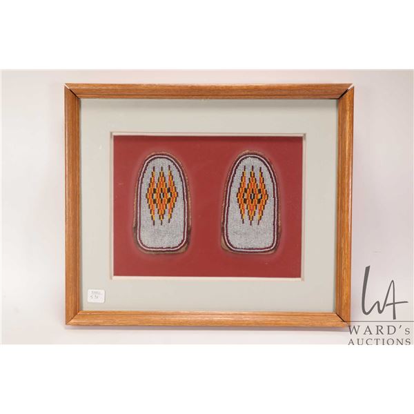 Vintage framed Indigenous beadwork moccasin covers, overall dimensions including frame 14" X 16 1/2"