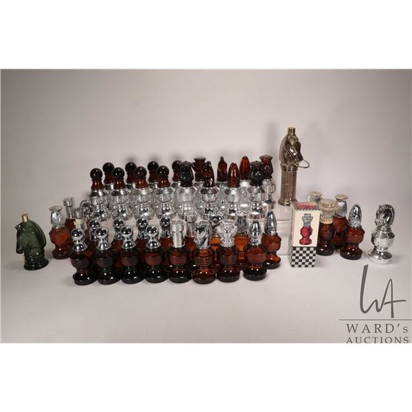 Forty four vintage Avon chess pieces half containing an amount of Avon gent's fragrance, some full. 