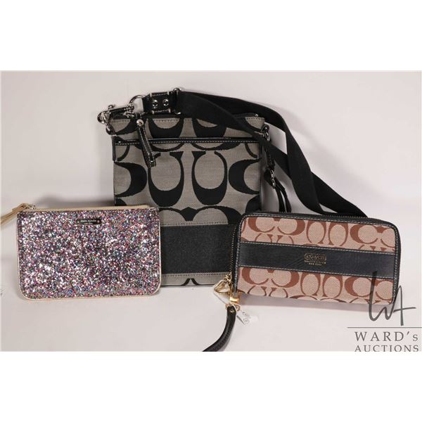 Coach Signature Stripe cross body purse, a Coach Signature Stripe Legacy accordion zip wallet and a 