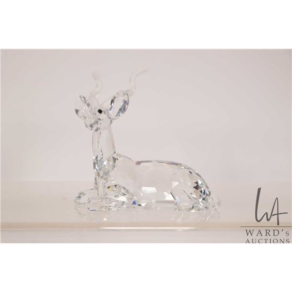 Swarovski crystal "Kudu" no. 75703 4" in height. From the Inspiration Africa Collection. Includes or