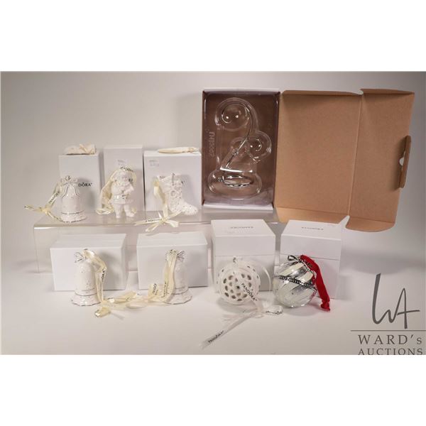 Seven boxed Pandora collectible Christmas ornaments and an ornament hanger