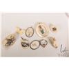 Image 1 : Selection of ivory and bone carvings including scrimshaw elk tooth, pendants etc. Can not be shipped