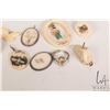 Image 3 : Selection of ivory and bone carvings including scrimshaw elk tooth, pendants etc. Can not be shipped