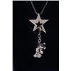 Image 2 : Swarovski crystal star on box chain with two hanging charms including teddy bear and a pair of   Dis