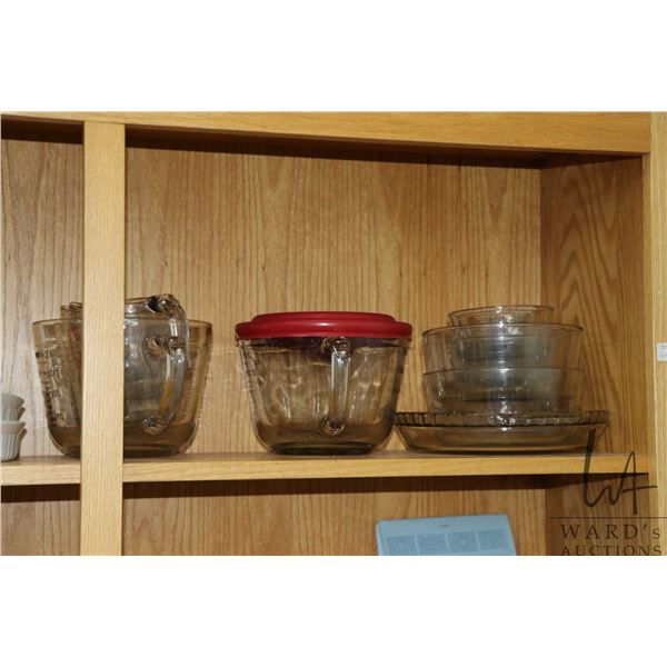 Selection of Anchor Hocking cookware including large lidded measuring cup, pie plate and five assort