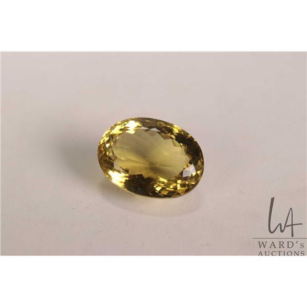 54.49 ct lemon quartz mixed cut oval gemstone with certificate provided by consignor