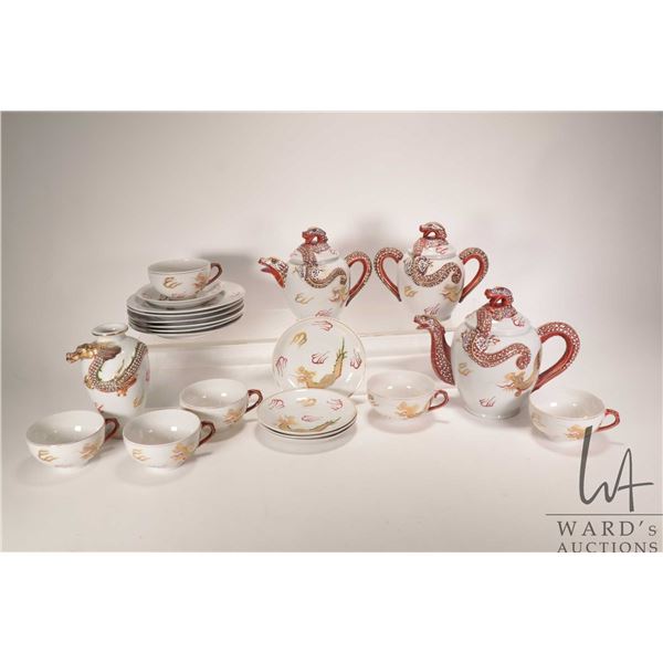 Japanese "Dragonware" Kutani porcelain tea set with moriage beaded detailing and lithopane Geisha in
