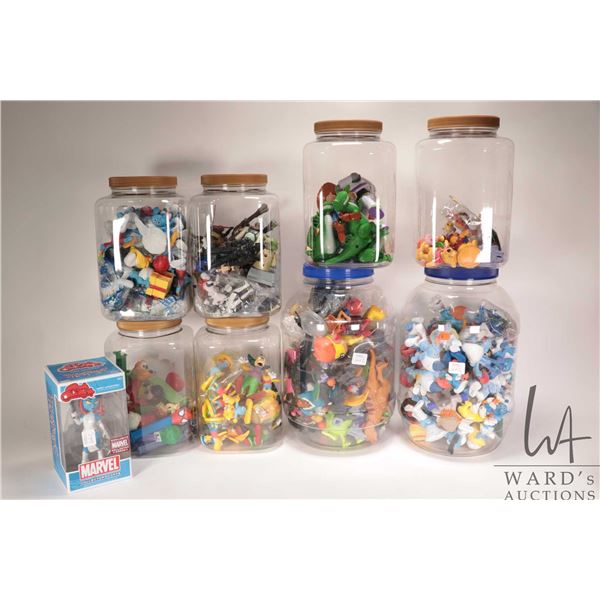 Large selection of collectible plastic characters and toys