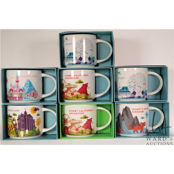 Seven Starbucks coffee mugs Disney Parks "You Are Here" collection featuring Orlean Square with purp