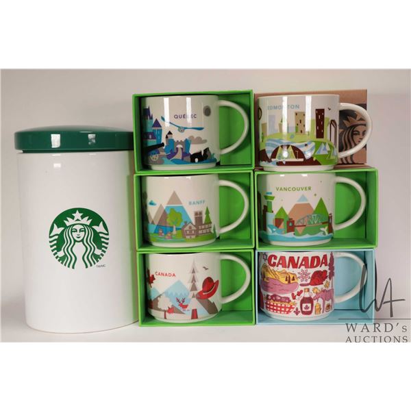 Five Starbucks coffee mugs from the "You Are Here" collection including Banfff, Vancouver and Edmont