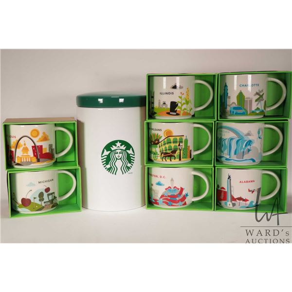 Eight Starbucks coffee mugs from the "You Are Here" collection including Alabama, Niagra Falls, Illi