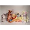 Image 1 : Six Winnie-the-Pooh stuffed animals including Winnie, Eyore, Tigger, Rue and Mama and Rabbit