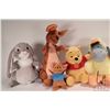 Image 2 : Six Winnie-the-Pooh stuffed animals including Winnie, Eyore, Tigger, Rue and Mama and Rabbit