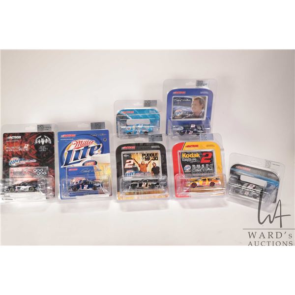 Seven 1: 64 scale Rusty Wallace Action die-cast collectible cars with assorted themes including rock