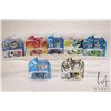 Image 1 : Seven limited edition Action 1: 64 scale collectible Disney themed cars including Mickey, Goofy, Pet