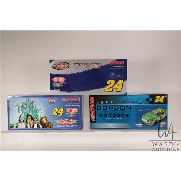 Three limited edition Action 1: 24 scale Jeff Gordon die cast collectible cars including Nicorette, 