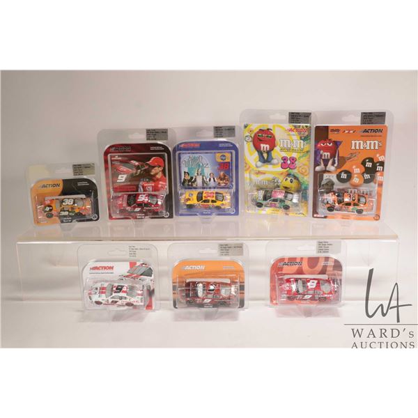 Eight 1: 64 scale die cast collectible race cars including Kasey Kane 2004-2005 and Elliot Sadler 20