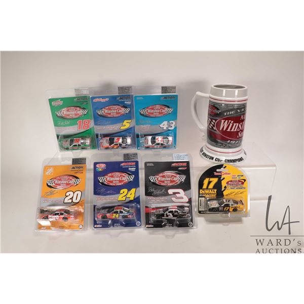 Seven 1: 64 scale die cast collectible race cars and a Winston Victory Lap Cup
