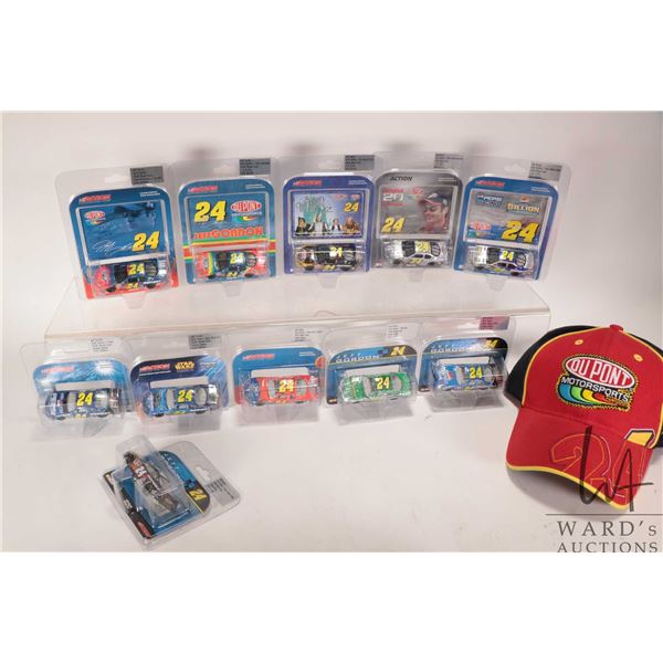 Eleven 1: 64 scale die cast collectible Jeff Gordon race cars and a Du Pont Motorsport ball cap