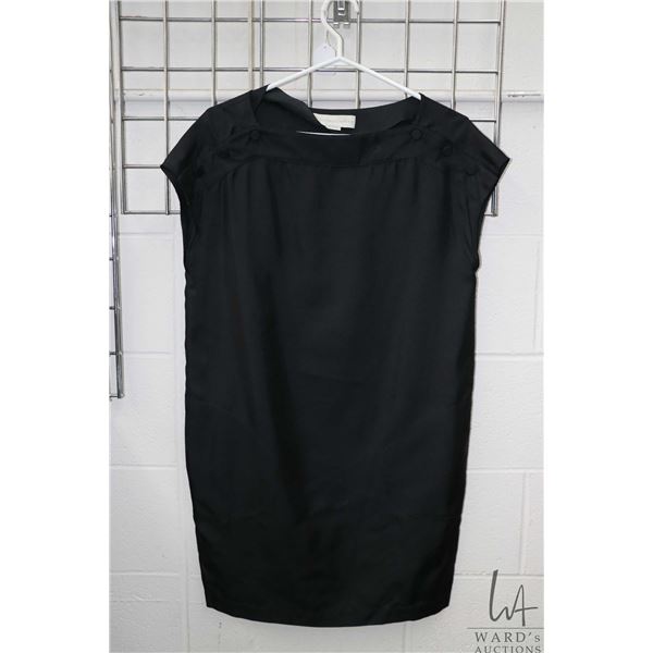 Vintage Stella McCartney black silk dress with triple button shoulder closure and pockets, appears t