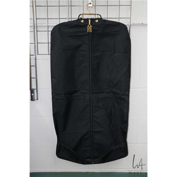 Vintage Moschino vinyl zippered garment bag Note: buyers must satisfy themselves as to authenticity.