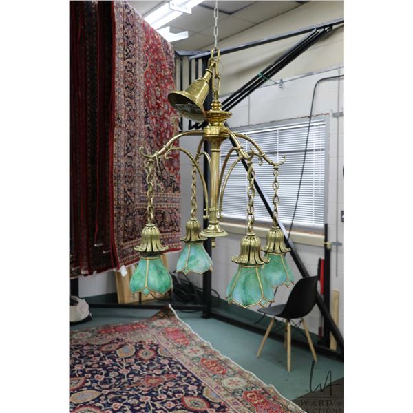Antique brass four branch ceiling fixture with green slag glass shades, approximately 21" in diamete