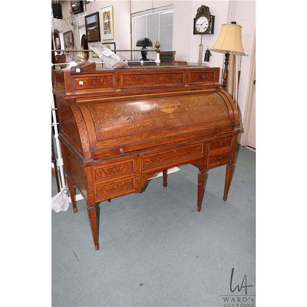 Antique Louis XVI walnut cylinder desk with extensive decorative inlay, leather top pull out writing
