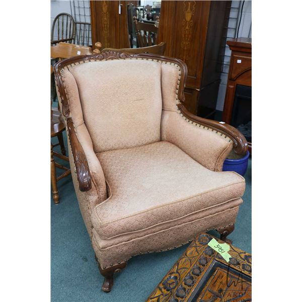 Antique full size sofa and chair with nail head decoration and show wood, 74" in wide