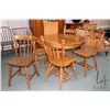 Image 1 : 40" diameter center pedestal maple dinette table with one 15" skirted leaf and four arrow back chair