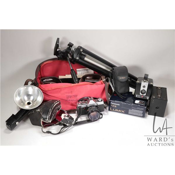 Selection of vintage camera equipment including Minolta Model XG7 camera with two lenses, flash etc.