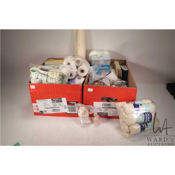 Two boxes of craft supplies including porcelain santas and doll kits, selection of oval needlework f