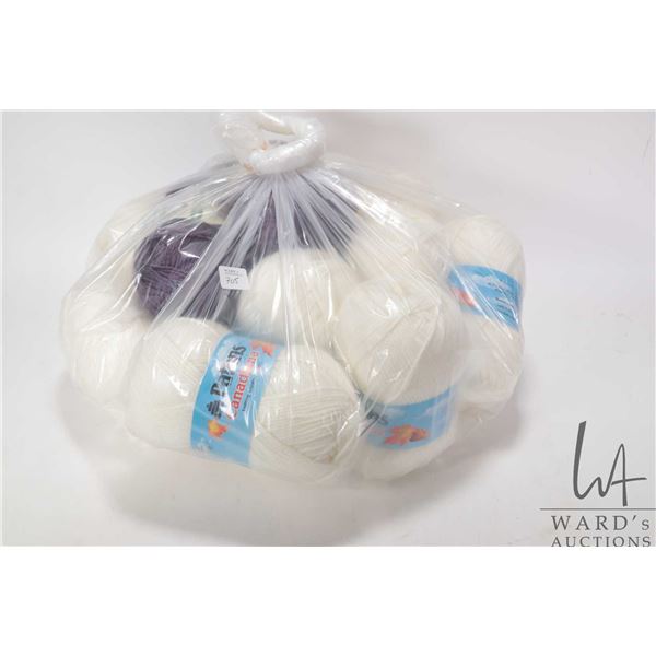 Ten balls of Patons Canadiana Winterwhite kniting worsted weight wool, two balls of Red Heart recycl