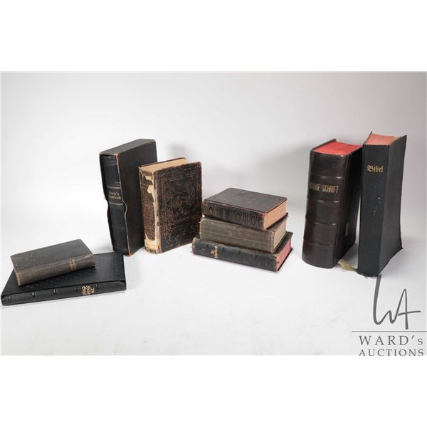 Nine antique hard cover and leather bound books including German bibles and religious books plus an 
