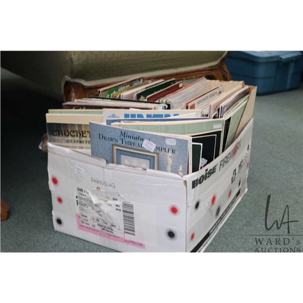 Large box filled with an assortment of craft patterns including embroidery, lace making etc.